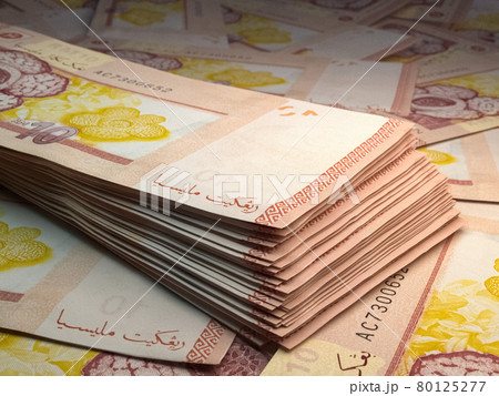 Malaysian money. Malaysian ringgit banknotes. 10 MYR ringgits bills. 80125277