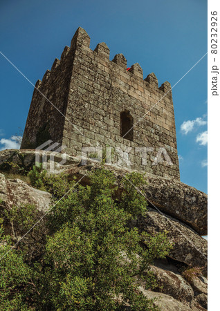 Square tower made of stone in a castle 80232926