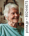 Portrait of old lady with white hair and smile 80244675
