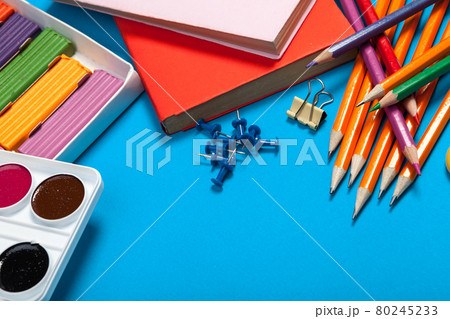 school supplies at abstract colorful background texture 80245233