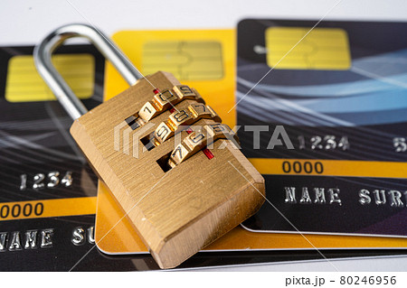 Credit card with password key lock isolated on white background. 80246956