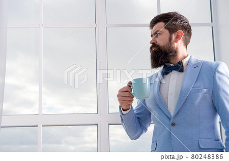 modern businessman. thoughtful bearded man drink coffee.  80248386