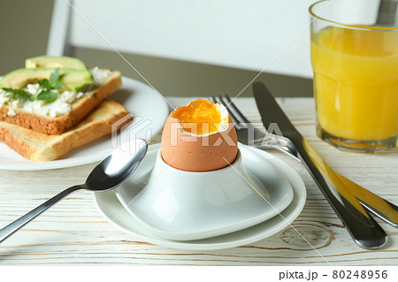 Concept of tasty breakfast with boiled egg, close up Concept of tasty breakfast with boiled egg, close up 80248956