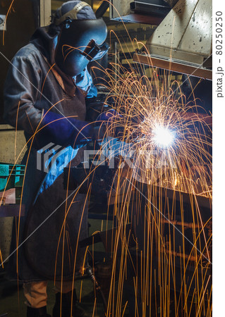 Movement Worker With Protective Mask Welding Metalの写真素材
