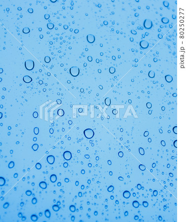 Water drops on glass Water drops on glass 80250277