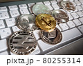 Bitcoin cryptocurrency coin on the background of the keyboard 80255314