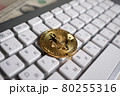 Bitcoin cryptocurrency coin on the background of the keyboard 80255316