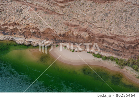 The Colorado River flowing under the Navajo Bridge. At the Marble Canyon of the Grand Canyon National Park in Arizona. The Colorado River flowing under the Navajo Bridge. At the Marble Canyon of the Grand Canyon National Park in Arizona. 80255464