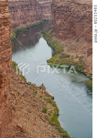 The Colorado River flowing under the Navajo Bridge. At the Marble Canyon of the Grand Canyon National Park in Arizona. The Colorado River flowing under the Navajo Bridge. At the Marble Canyon of the Grand Canyon National Park in Arizona. 80255465
