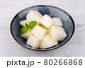 slices of fresh juicy melon, served with mint 80266868