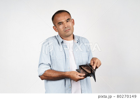 Upset mature man holding his empty wallet on white background. financial crisis, bankruptcy, no money, bad economy Concept. Upset mature man holding his empty wallet on white background. financial crisis, bankruptcy, no money, bad economy Concept. 80270149