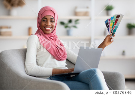 Muslim Women Jobs. Black Islamic Designer Lady With Laptop And Color Swatches 80276346