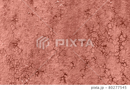 Texture of rough painted terracotta wall cracked from time Texture of rough painted terracotta wall cracked from time 80277545