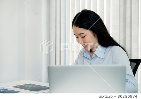 Businesswoman analysis the chart and meeting Video Conferencing with laptop at the home office for setting challenging business goals And planning to achieve the new target Businesswoman analysis the chart and meeting Video Conferencing with laptop at the home office for setting challenging business goals And planning to achieve the new target 80280974