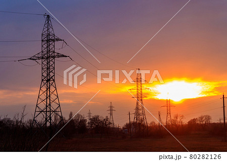 High voltage power line at sunset High voltage power line at sunset 80282126