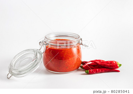 Hot chili pepper sauce paste harissa. Adjika. Traditional Tunisia, Georgian and Arabic cuisine. 80285041