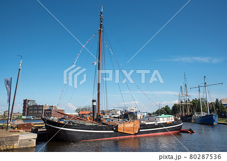 Old sailing boats in the harbor of Den Helder, the Netherlands. 80287536