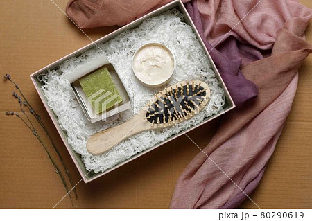 A gift set of eco-friendly products for hair and scalp care. Indian soap nut, dry shampoo with herbal extracts and a wooden comb A gift set of eco-friendly products for hair and scalp care. Indian soap nut, dry shampoo with herbal extracts and a wooden comb 80290619