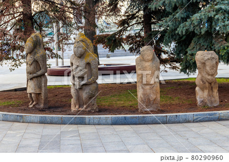 Ancient stone statues of the scythian warriors in Kharkov, Ukraine 80290960