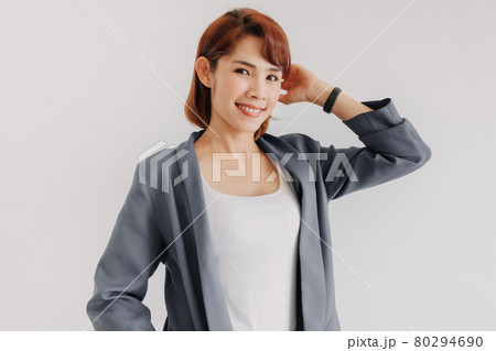 Businesswoman in white and blue casual suit and white background. 80294690