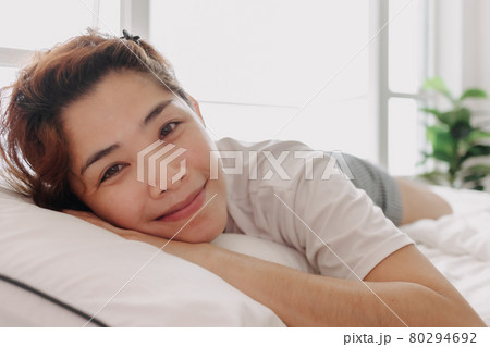 Close up of happy woman just wake up in warm morning of summer. 80294692