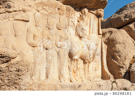 Naqsh Rajab, Naqsh-e Rajab, archaeological site of four limestone rockface inscriptions and bas-reliefs that date to the early Sassanid era, located about 12 km north of Persepolis. Naqsh Rajab, Naqsh-e Rajab, archaeological site of four limestone rockface inscriptions and bas-reliefs that date to the early Sassanid era, located about 12 km north of Persepolis. 80298161