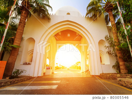 Facade of arch at the entrance beautiful hotel in Egypt. Facade of arch at the entrance beautiful hotel in Egypt. 80305546