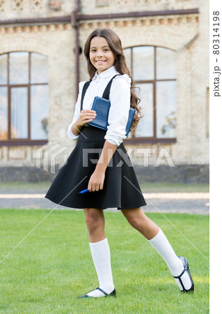Lesson learnt. Happy small girl back to school. Small kid Lesson learnt. Happy small girl back to school. Small kid 80314198