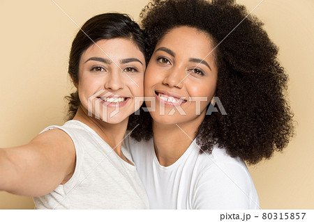 Happy diverse girlfriends make self-portrait picture together 80315857