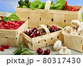 Harvest vegetables in wooden basket on light background 80317430