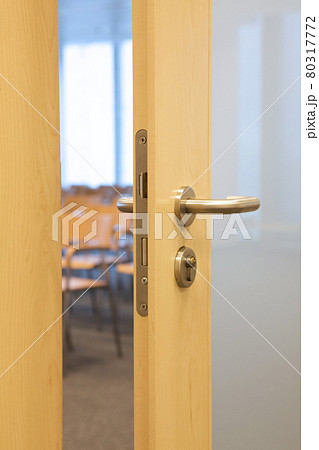 Empty office seen through open door Empty office seen through open door 80317772