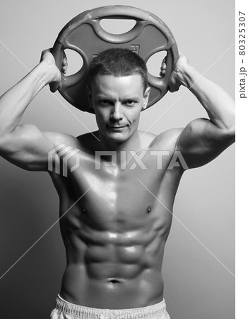 muscular Man. Sport Gym. barbell bodybuilder 80325307