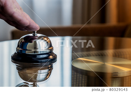 service bell in a hotel, restaurant or other promises 80329143