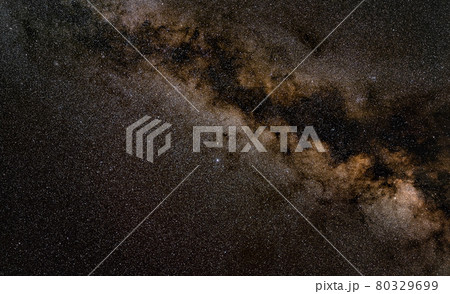 Night sky, many stars with milky way around Aquila constellation visible. Long exposure stacked photo 80329699