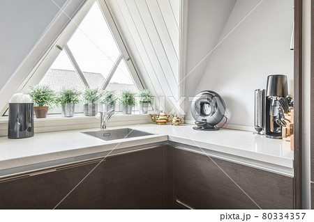 Interior of a beautiful kitchen of an elite house Interior of a beautiful kitchen of an elite house 80334357
