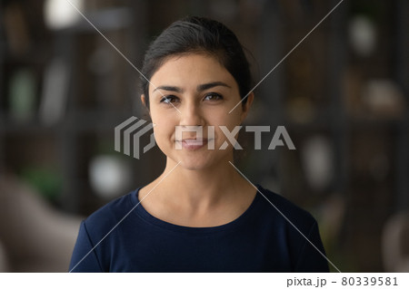 Headshot portrait of smiling Indian woman renter Headshot portrait of smiling Indian woman renter 80339581