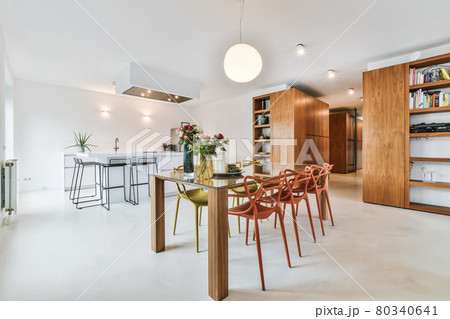 Bright dining room with decorative table and chairs 80340641
