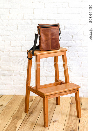 Beautiful brown bag made of leather designed for various items 80344450