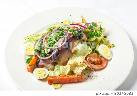 Salad with mackerel fish, zucchini, lettuce, carrots and creamy dressing Salad with mackerel fish, zucchini, lettuce, carrots and creamy dressing 80345032