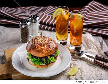 Sandwich with chicken burger, tomatoes, cheese and lettuce Sandwich with chicken burger, tomatoes, cheese and lettuce 80345052