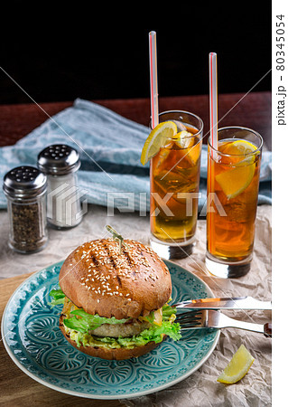 Sandwich with chicken burger, cheese and lettuce Sandwich with chicken burger, cheese and lettuce 80345054