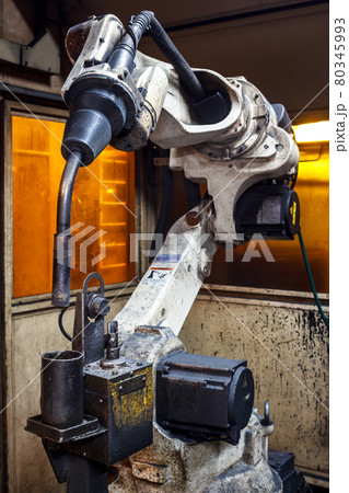 Welding robots movement in a car factory Welding robots movement in a car factory 80345993