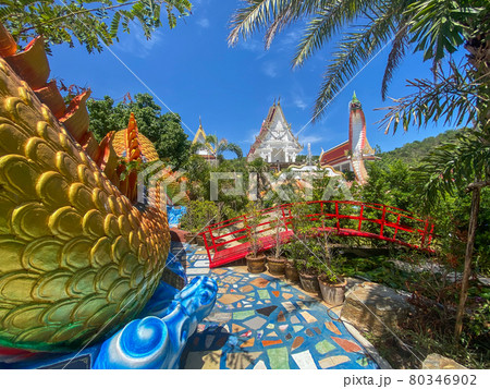 Wat Khao Sung Chaem Fa temple with giant snake and reclining gold buddha, in Kanchanaburi, Thailand Wat Khao Sung Chaem Fa temple with giant snake and reclining gold buddha, in Kanchanaburi, Thailand 80346902
