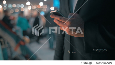 Businessman keeping in touch Businessman keeping in touch 80348289