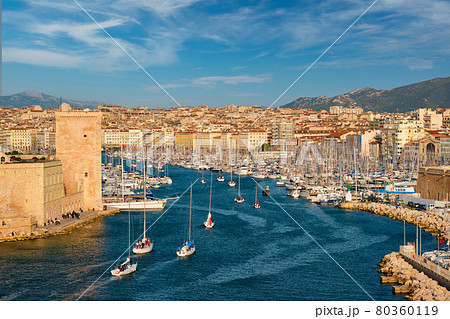 Yachts coming to Marseille Old Port on sunset. Marseille, France 80360119