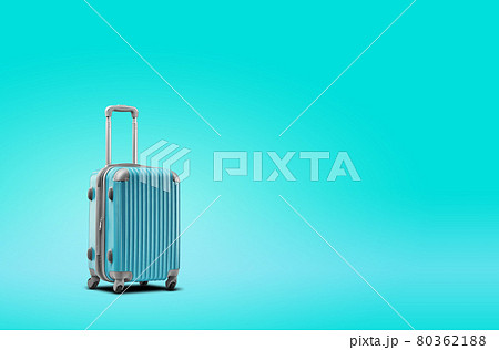 Blue suitcase is standing against turquoise background. A realistic shadow is drawn in under it. Collage. Copy space, close-up. Blue suitcase is standing against turquoise background. A realistic shadow is drawn in under it. Collage. Copy space, close-up. 80362188
