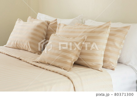 Comfortable soft pillows on the bed Comfortable soft pillows on the bed 80371300