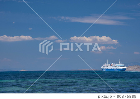 Ferry boat and the blue Mediterranean sea in the Saronic gulf, Greece. 80376889