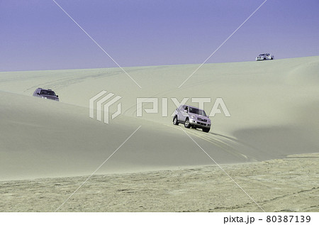 Desert safari on sand dunes of Qatar Desert safari on sand dunes of Qatar 80387139