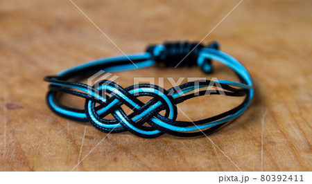 Bead bracelet on the wooden table Bead bracelet on the wooden table 80392411